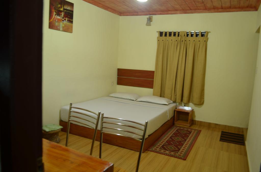 Rheinberg Town Haus Hotel Munnar Quarto foto